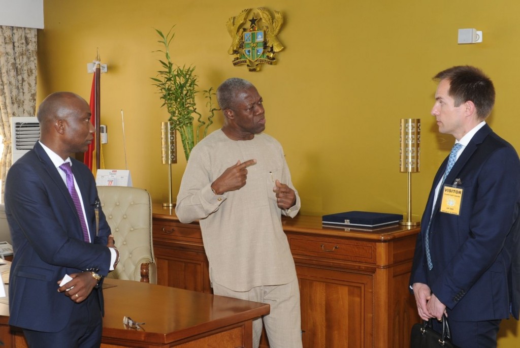 Vice President K. B. Amissah-Arthur explaining a point to Mr Angus Downie, Ecobank Group Head of Research, whilst Mr Michael N. A. Cobblah, Ecobank Country Representative looks on.