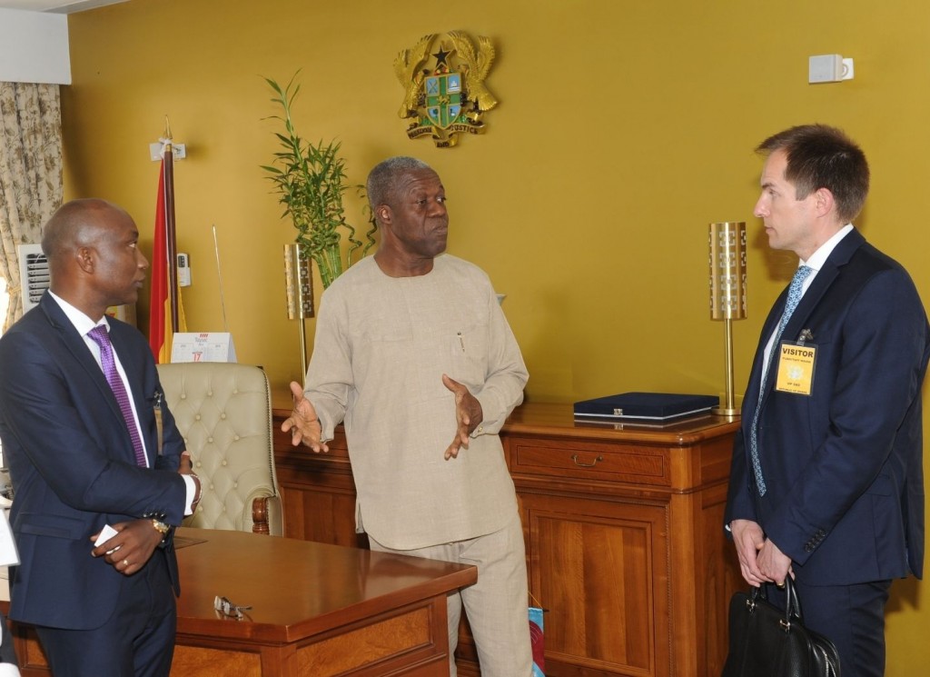 Vice President K. B. Amissah-Arthur explaining a point to Mr Angus Downie, Ecobank Group Head of Research, whilst Mr Michael N. A. Cobblah, Ecobank Country Representative looks on.1