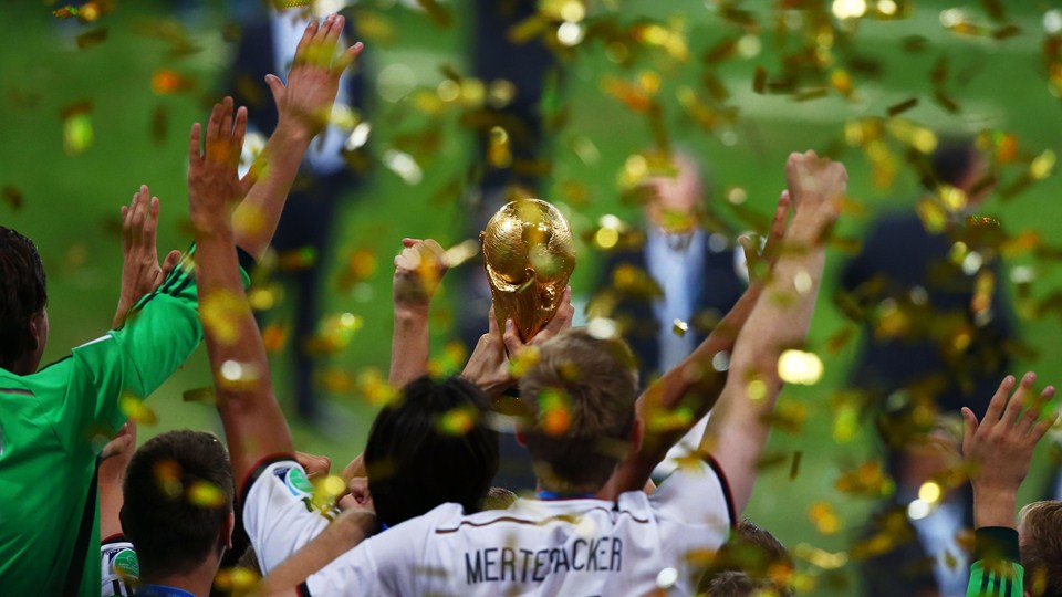 Germany-celebrate-with-the-World-Cup-trophy-after-defeating-Argentina-1-0-in-extra-time