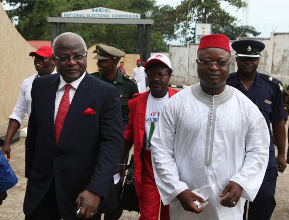 File photo of Sierra Leone's President Koroma and Vice President Sam-Sumana arriving at National Electoral Commission in Freetown